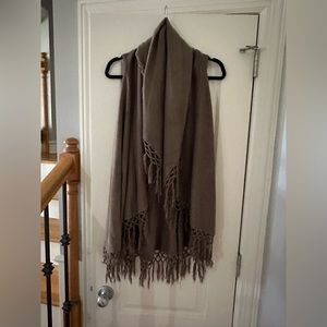 Fringe vest. Open front with no buttons. . One size.